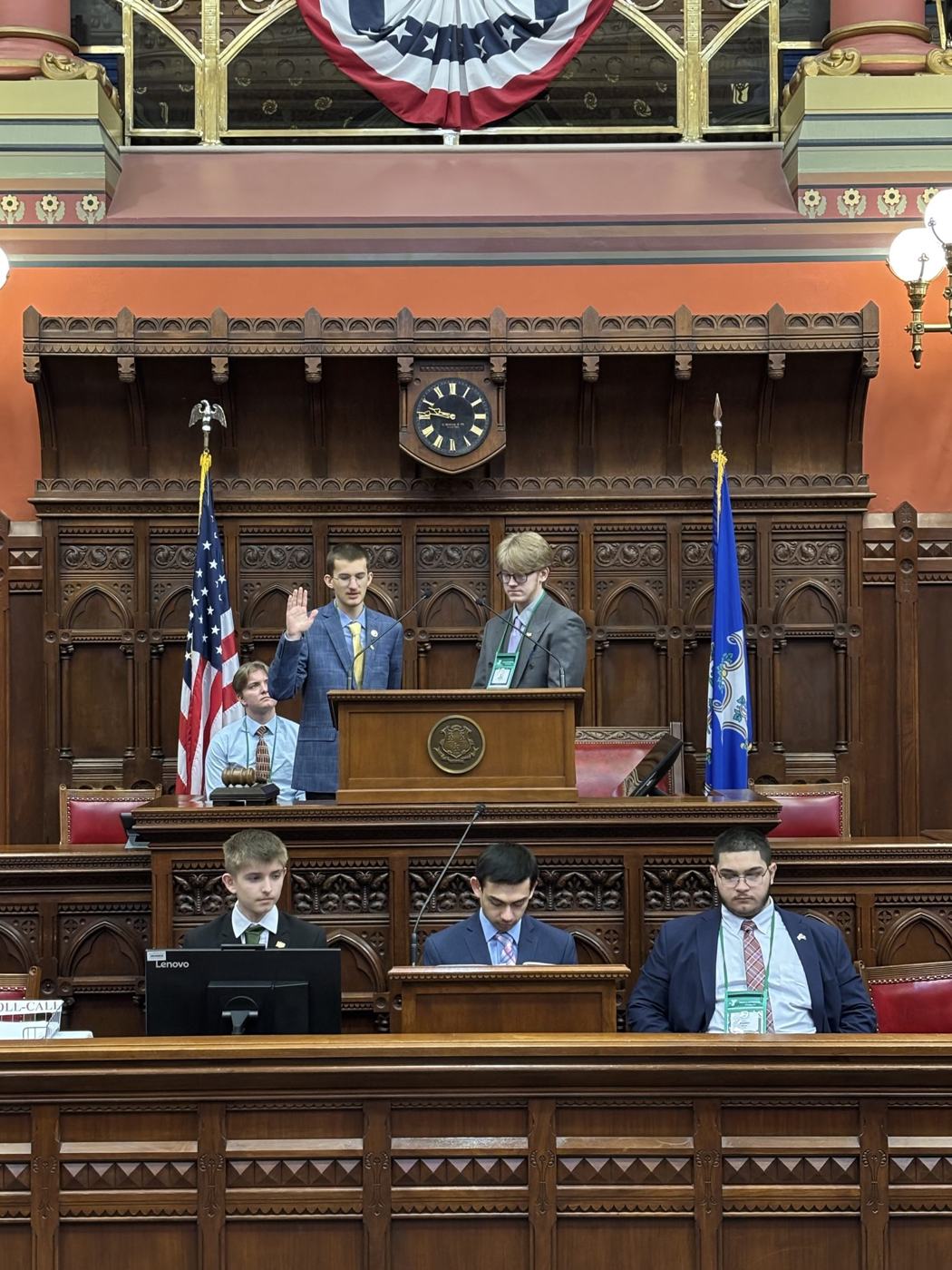 A student taking the oath at the Connecticut House rostrum