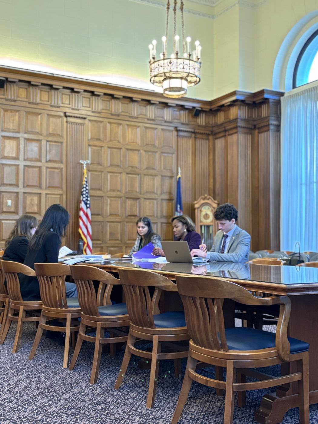 Students working in a Capitol committee room