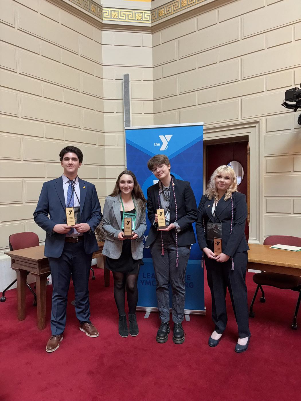 Rhode Island students holding their awards